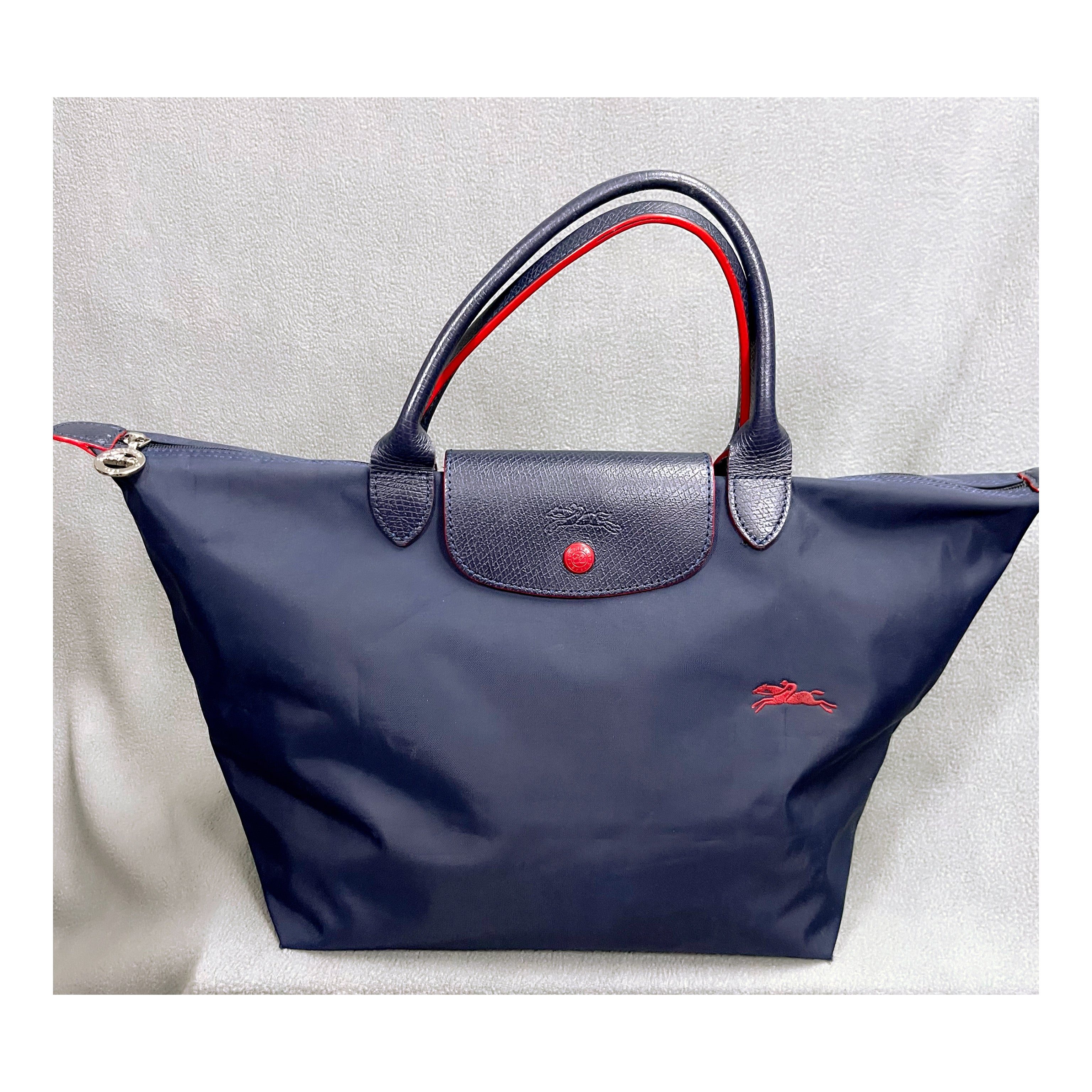 Longchamp Le Pliage navy and red tote